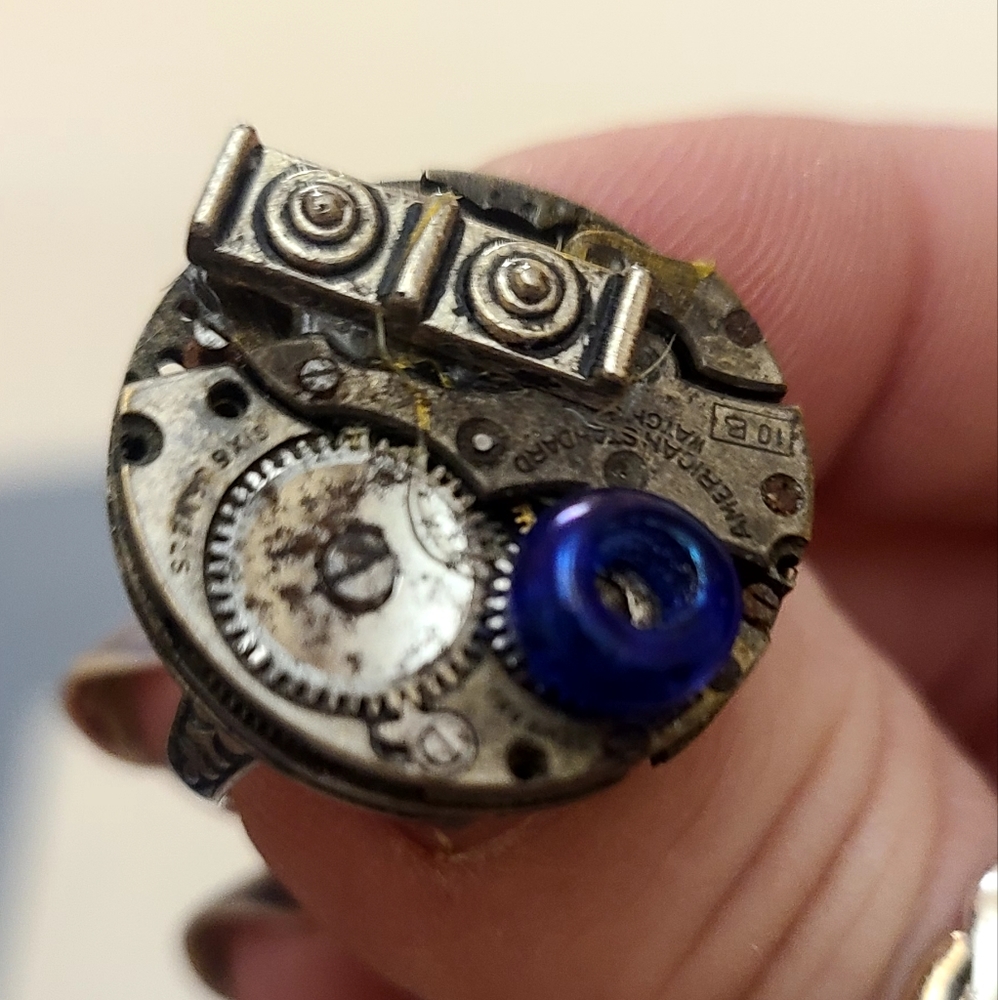 Steampunk vintage clock ring with floral base and adjustable.